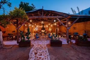 A patio or other outdoor area at GÜLER BUTİK HOTEL