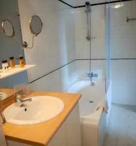 Koupelna v ubytování Hotel Myrtilles
