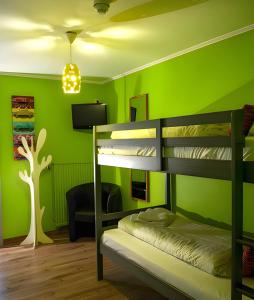 Postel nebo postele na pokoji v ubytování Hotel Myrtilles