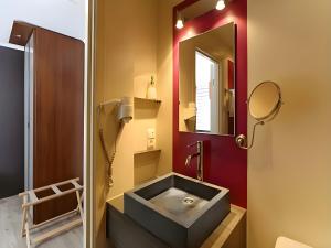 Koupelna v ubytování Hotel Myrtilles