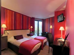 Postel nebo postele na pokoji v ubytování Hotel Myrtilles