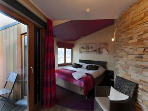 Postel nebo postele na pokoji v ubytování Hotel Myrtilles