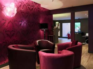 TV a/nebo společenská místnost v ubytování Hotel Myrtilles