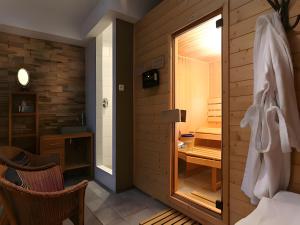Postel nebo postele na pokoji v ubytování Hotel Myrtilles