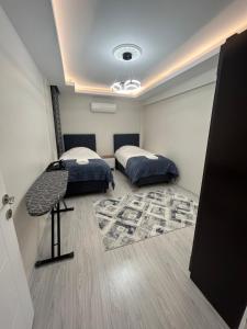 Llit o llits en una habitació de Luxury Apartment in Fethiye City Center