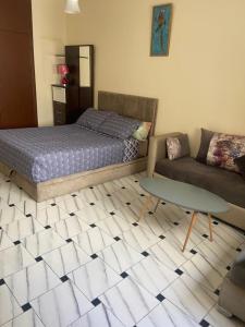 Postel nebo postele na pokoji v ubytování appartement au centre de Tanger Nejma