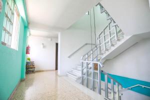 an empty hallway with stairs in a house at Pa´Xa Mama Hotel Boutique in Cancún