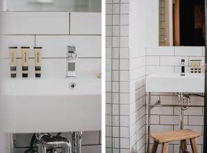 uma casa de banho branca com um lavatório e um banco de madeira em The Amalfi Minimalist Room 604 em Hepburn Springs