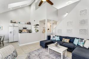 a living room with a couch and a table at 3224 Birdseye Circle in Gulf Breeze