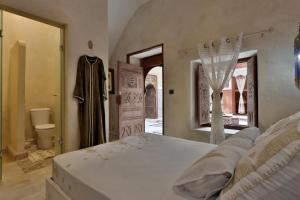 Postel nebo postele na pokoji v ubytování Riad La Fayette Bed & Breakfast