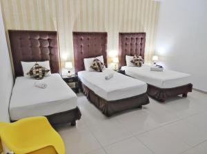 Postel nebo postele na pokoji v ubytování Hotel Boutique Casa Umiña