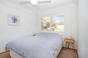 En eller flere senge i et værelse på Moola Palms