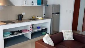 Nhà bếp/bếp nhỏ tại Aspromonte Departamentos +24 ảnh