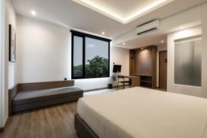 Katil atau katil-katil dalam bilik di Assa Hotel
