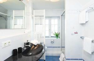 Køkken eller tekøkken på Ferienhaus-Hoppe-Wohnung-01