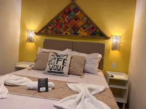 Llit o llits en una habitació de Flats Villas Litoral Sul - Praia Pontal do Peba - Piaçabuçu - AL