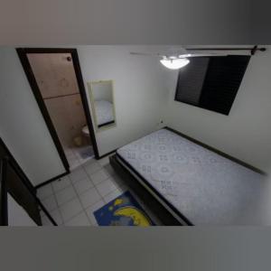 A bed or beds in a room at Triplex White em Caiobá-Matinhos-Pr a 200 mt do mar