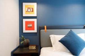 Uma cama ou camas num quarto em Livetour Hotel Sanxi Metro Guangzhou