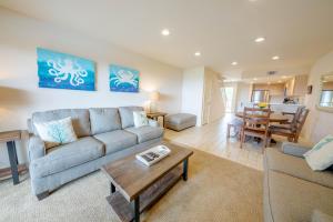 a living room with a couch and a table at Seascape Ocean View Condo in Aptos