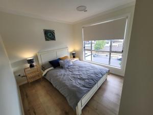 Φωτογραφία από το άλμπουμ του Luxury 5 Bedrooms Schofields Home + Back yard σε Schofields