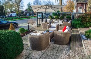 Posezení v ubytování Alp de Veenen Hotel
