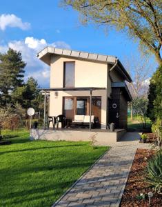 a house with a pitched roof at Palatinus Apartman Esztergom in Esztergom