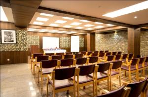 a conference room with chairs and a table in the middle at Vikram Vintage Inn in Nainital