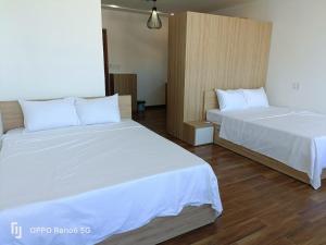 Postelja oz. postelje v sobi nastanitve Tree Homestay