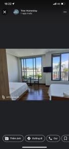 Postelja oz. postelje v sobi nastanitve Tree Homestay
