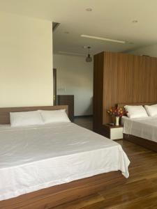 Postelja oz. postelje v sobi nastanitve Tree Homestay