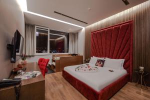 TV a/nebo společenská místnost v ubytování Hotel Bonsai