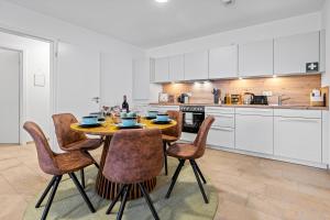 Nhà bếp/bếp nhỏ tại Smurmelhomes Oase: Terrasse - Parken - Kind