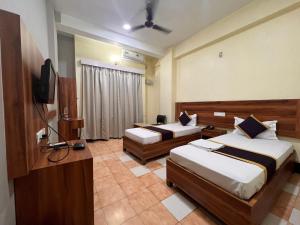 Hotel Bluemoon客房内的一张或多张床位