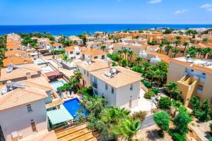 an aerial view of a villa with a resort at GREAT VILLA MARIA in Paralimni
