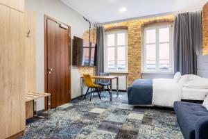 Apartamenty Browar Luxury Old Town Poznań 24h客房内的一张或多张床位
