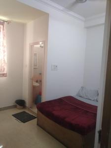 Katil atau katil-katil dalam bilik di MYSORE MAHALAKSHMI ROOMS