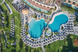 an overhead view of a pool at a resort at Atlantica Imperial Resort - Adults Only in Kolimbia