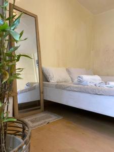 Postel nebo postele na pokoji v ubytování Malayah Hostel
