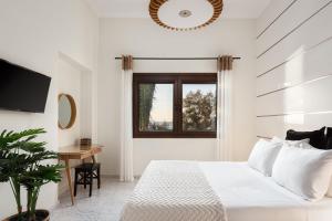 Ένα ή περισσότερα κρεβάτια σε δωμάτιο στο Aniv Villa by the Sea