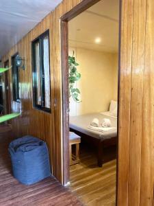 Postel nebo postele na pokoji v ubytování Malayah Hostel + 11 fotografií