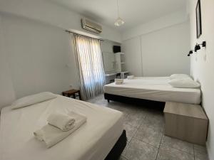 Posteľ alebo postele v izbe v ubytovaní Deep Blue Rooms & Apartments