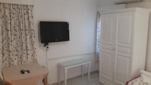 TV a/nebo společenská místnost v ubytování Pasha Motel + 37 fotografií