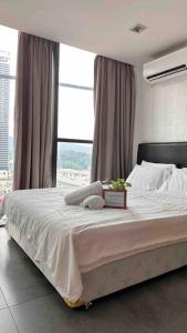 Llit o llits en una habitació de Free Parking, 6pax Family Duplex Empire Damansara