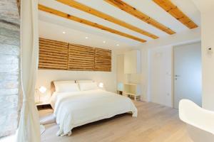 Postel nebo postele na pokoji v ubytování Grgur Ninski Rooms