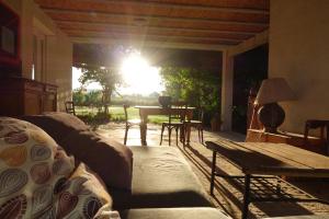 a living room with a couch and a table at Domaine Limouzy in Narbonne