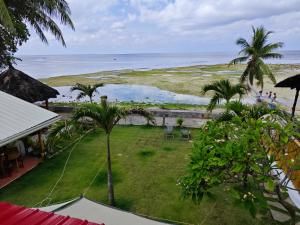a view of the ocean from a resort at Room-Cola Inn in Siquijor