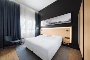 Postel nebo postele na pokoji v ubytování Park Inn by Radisson Makkah Thakher Alsharqi