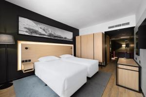 Postel nebo postele na pokoji v ubytování Park Inn by Radisson Makkah Thakher Alsharqi