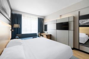 Postel nebo postele na pokoji v ubytování Park Inn by Radisson Makkah Thakher Alsharqi