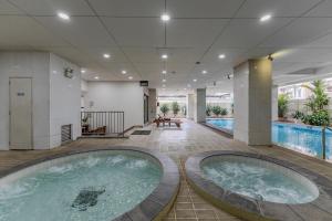 Bazén v ubytování Garden View Court Suites Ho Chi Minh City nebo v jeho okolí